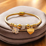 Razdora | 18K Gold Plated Bangle with Two Charms